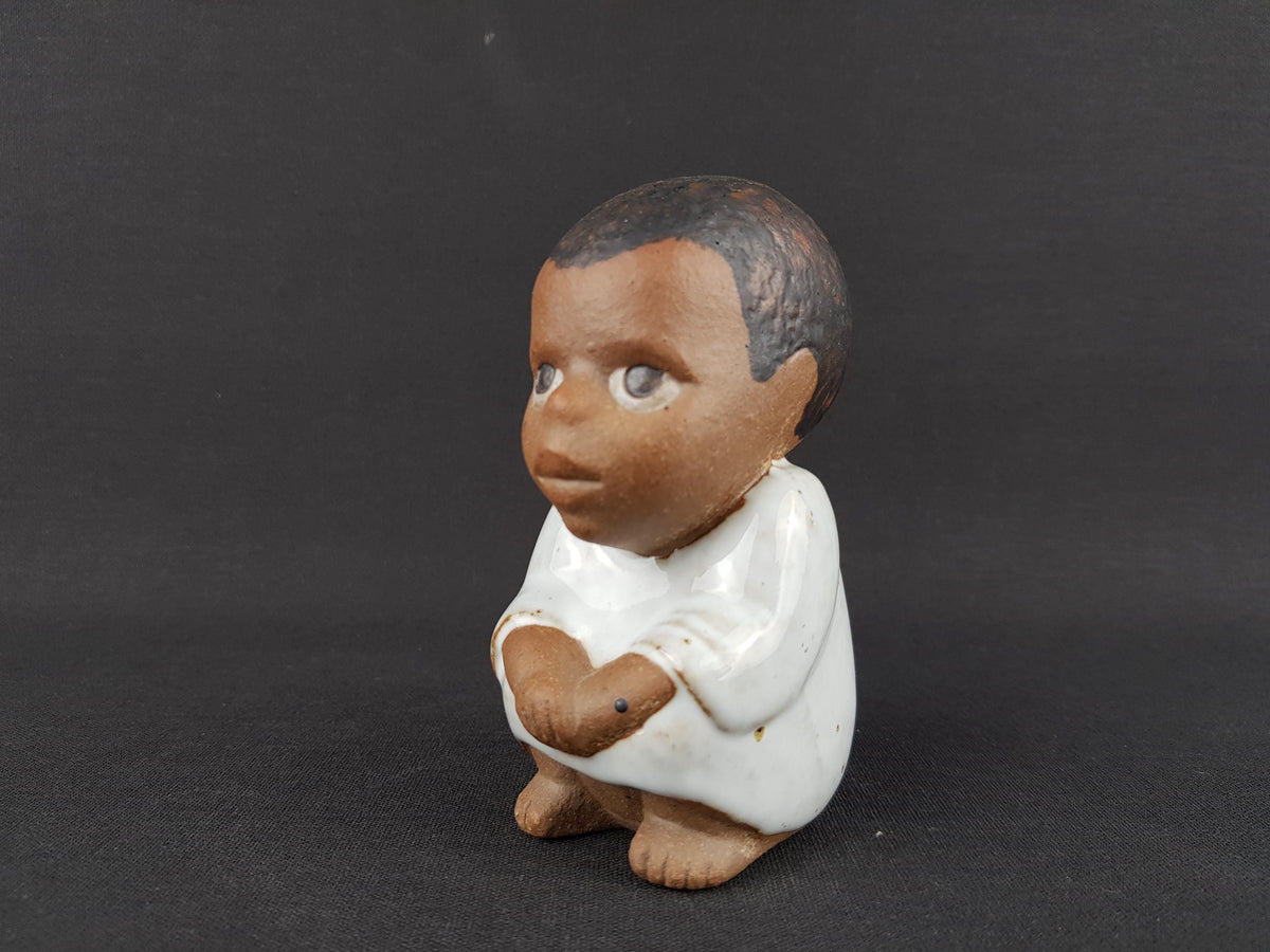 Vintage LISA LARSON Ceramic Boy "Syd" from the All Världens Barn Series of Gustavsberg Studio Pottery Sweden 1974s