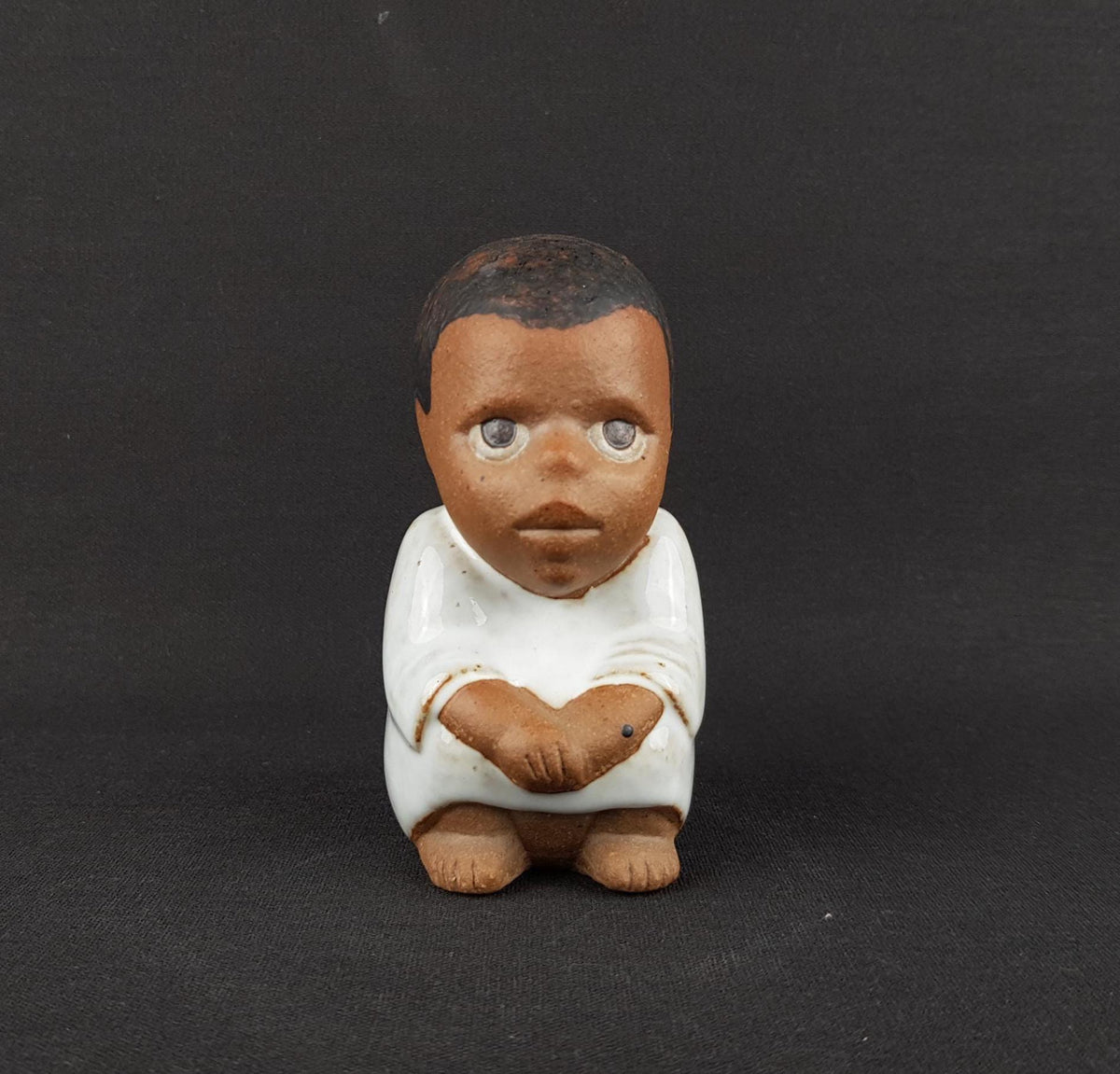 Vintage LISA LARSON Ceramic Boy "Syd" from the All Världens Barn Series of Gustavsberg Studio Pottery Sweden 1974s